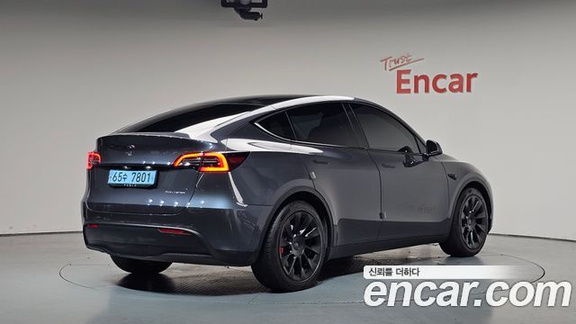 Tesla Model Y Long Range AWD - фото 1
