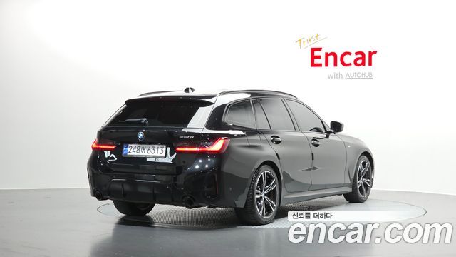 BMW 3-Series G20 320i Touring M Sports - фото 1