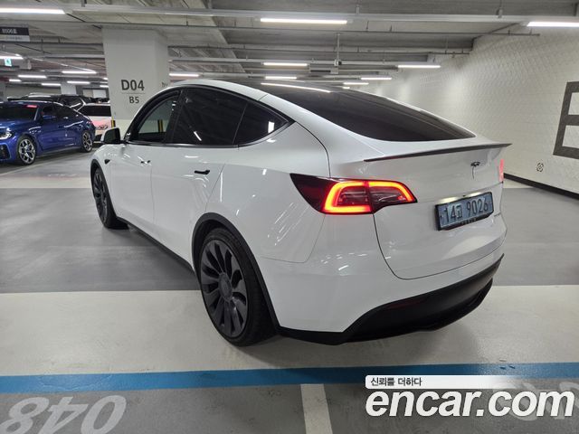 Tesla Model Y Performance AWD - фото 1