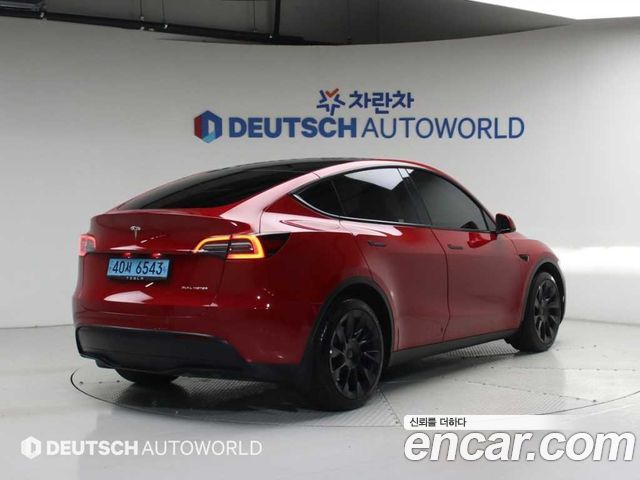 Tesla Model Y Long Range AWD - фото 1