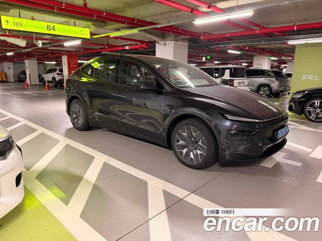 Tesla Model Y L Long Range AWD - фото 1