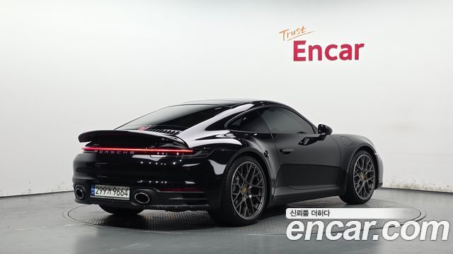 Porsche 911 Carrera - фото 1