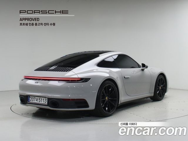 Porsche 911 Carrera 4 - фото 1