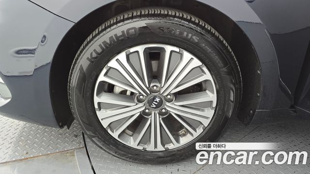 Kia K7 Premier, гибрид Signature - фото 4