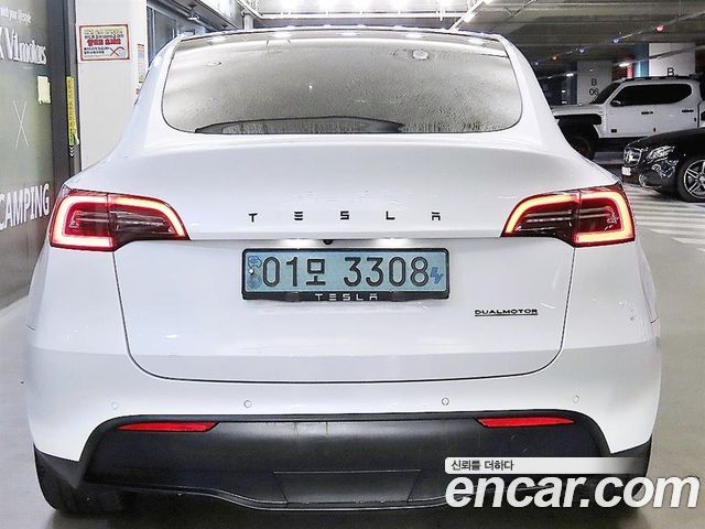 Tesla Model Y Standard Range RWD - фото 2