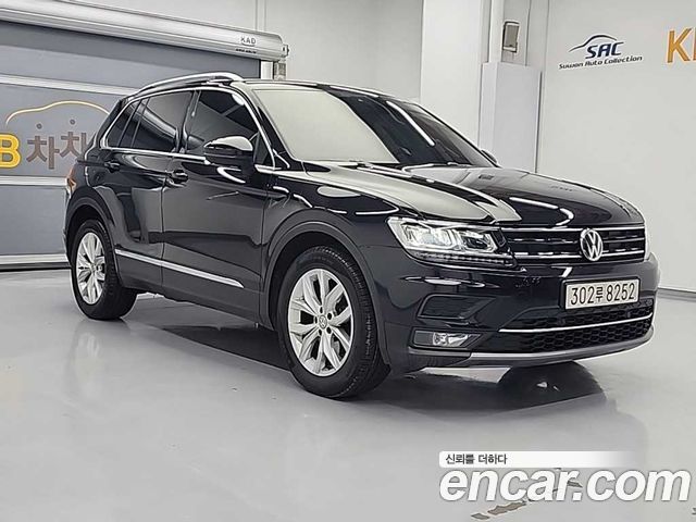 Volkswagen Tiguan 2-го поколения 2.0 TDI Premium - фото 3