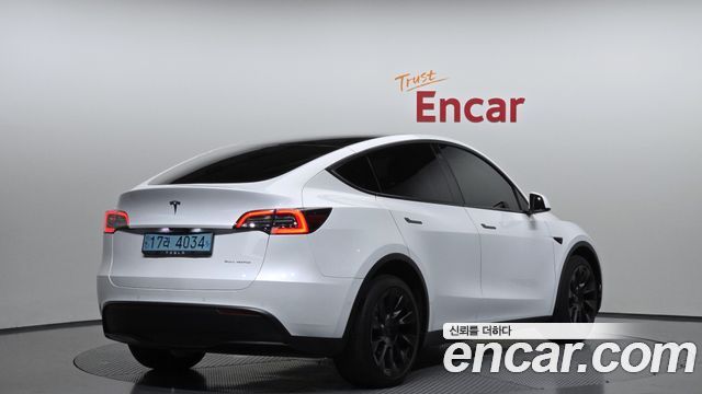 Tesla Model Y Long Range AWD - фото 1