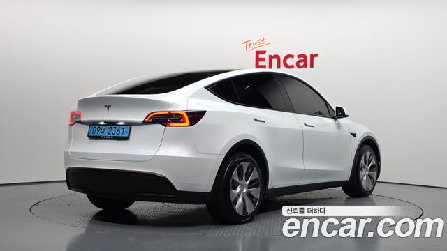 Tesla Model Y Long Range AWD - фото 1