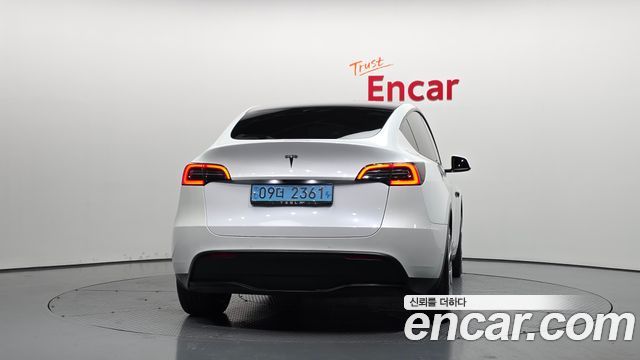 Tesla Model Y Long Range AWD - фото 3