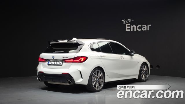 BMW 1-Series F40 M135i xDrive - фото 1