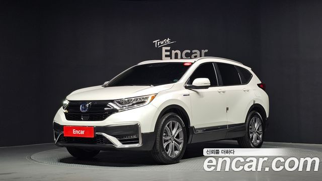 Honda CR-V 5-го поколения 2.0 Hybrid Touring 4WD - фото 0