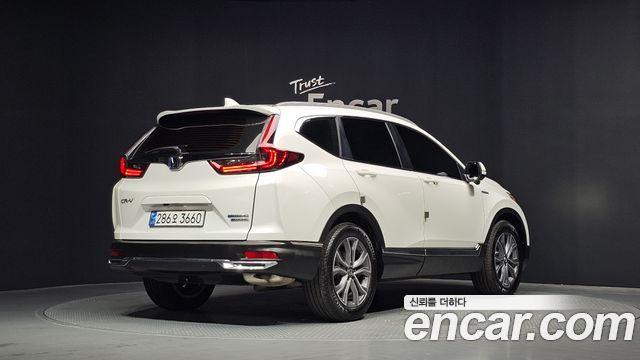 Honda CR-V 5-го поколения 2.0 Hybrid Touring 4WD - фото 1