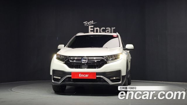 Honda CR-V 5-го поколения 2.0 Hybrid Touring 4WD - фото 2