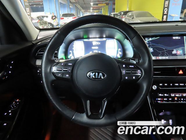 Kia K7 Premier, гибрид Signature - фото 4