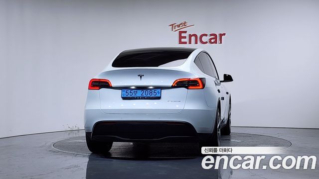Tesla Model Y Long Range AWD - фото 2