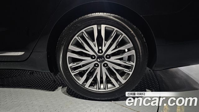 Kia K7 Premier, гибрид Signature - фото 4