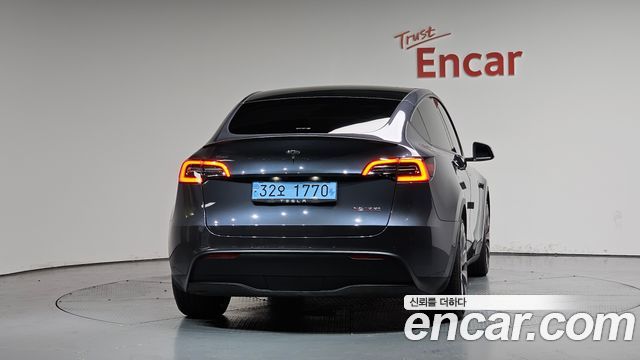 Tesla Model Y Performance AWD - фото 2
