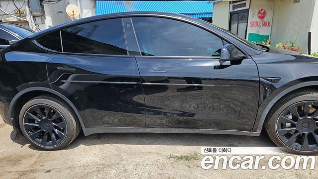 Tesla Model Y Long Range AWD - фото 2