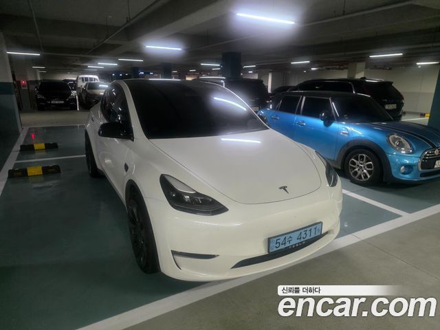 Tesla Model Y Performance AWD - фото 1