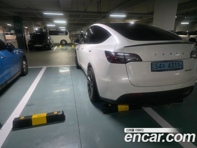 Tesla Model Y Performance AWD - фото 2