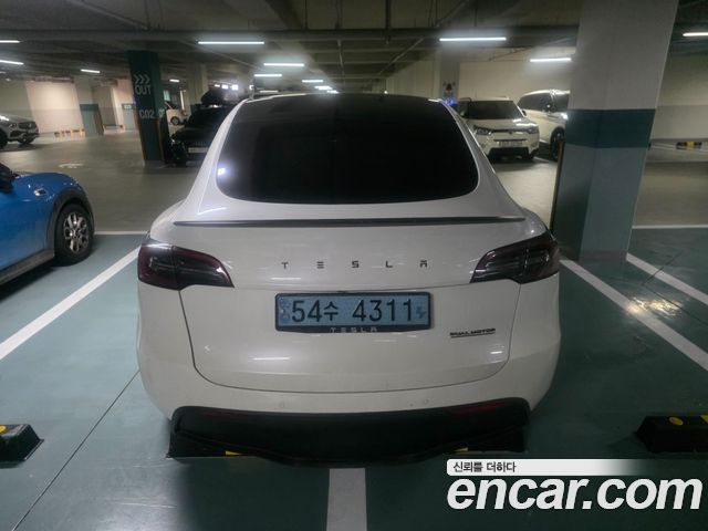 Tesla Model Y Performance AWD - фото 3