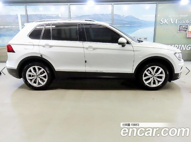 Volkswagen Tiguan 2-го поколения 2.0 TDI Premium - фото 2