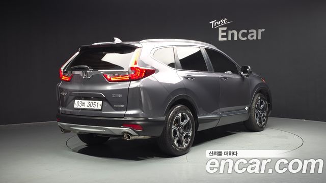 Honda CR-V 5-го поколения 1.5 Touring 4WD - фото 1