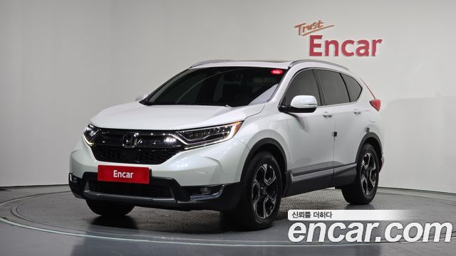 Honda CR-V 5-го поколения 1.5 Touring 4WD - фото 0