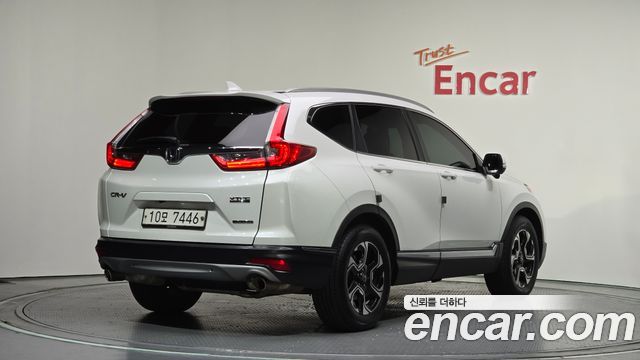 Honda CR-V 5-го поколения 1.5 Touring 4WD - фото 1