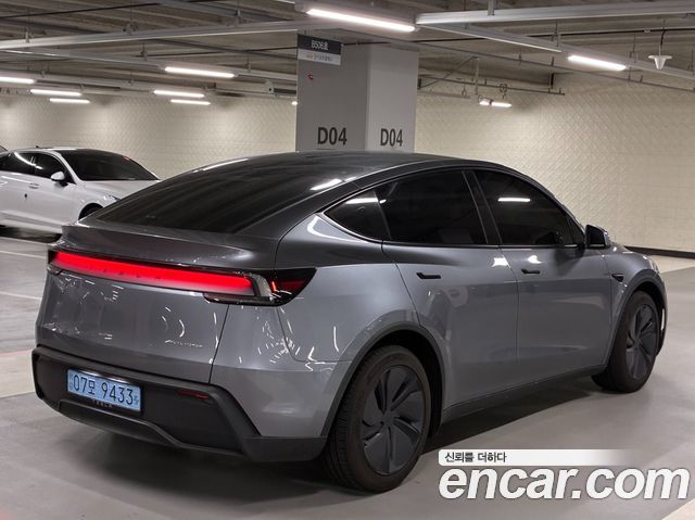 Tesla Model Y Long Range AWD - фото 4