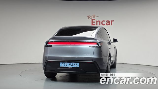 Tesla Model Y Long Range AWD - фото 2