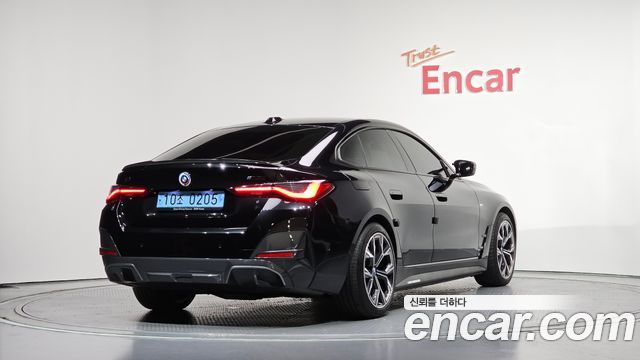 BMW i4 eDrive40 M Sports Pro - фото 1
