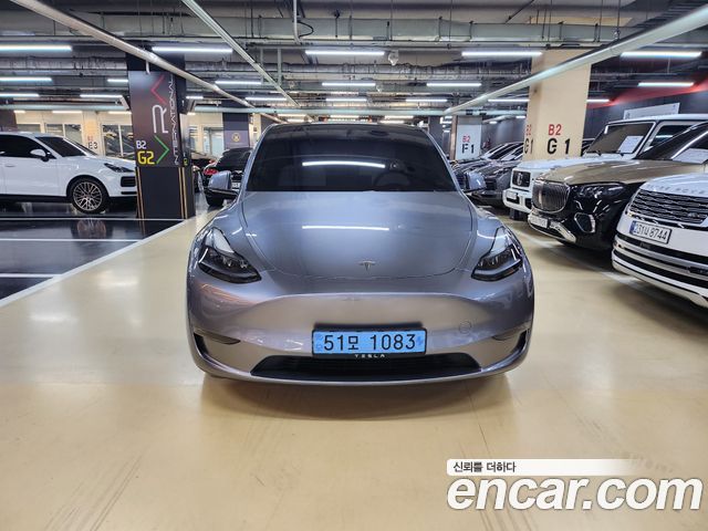 Tesla Model Y Long Range AWD - фото 1