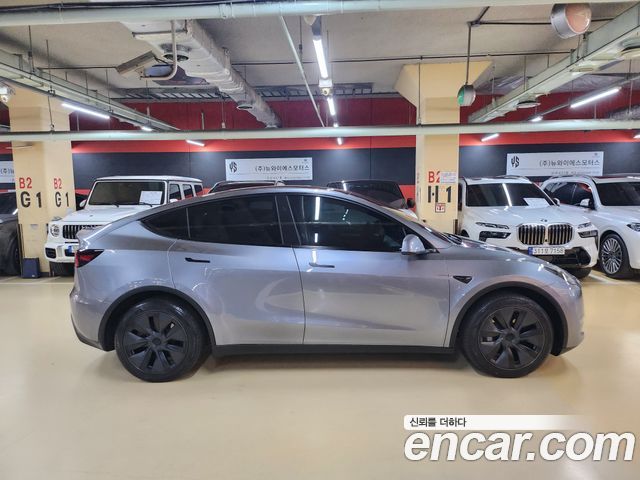Tesla Model Y Long Range AWD - фото 2