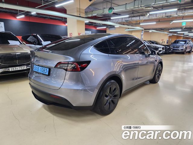 Tesla Model Y Long Range AWD - фото 3