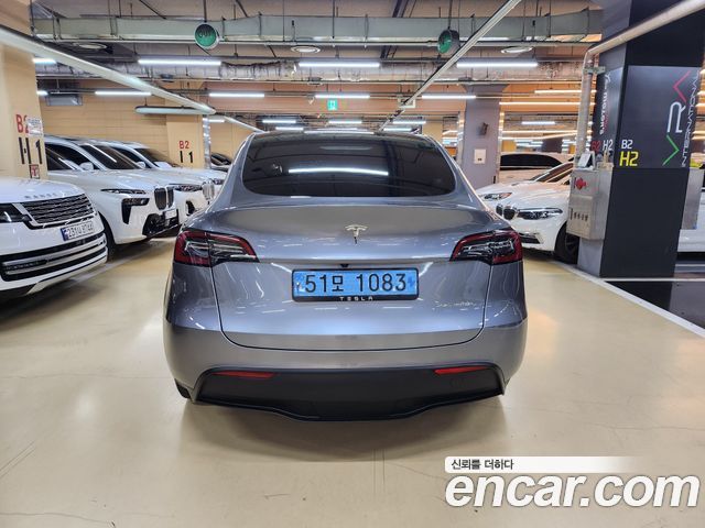 Tesla Model Y Long Range AWD - фото 4