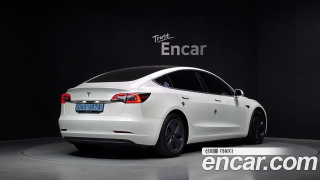 Tesla Model 3 Standard Range Plue RWD - фото 1