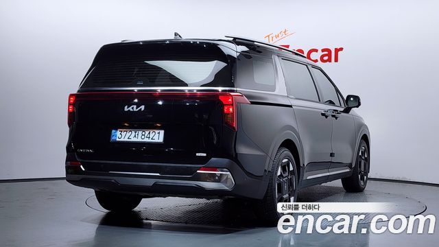 Kia Carnival Новый 4-го поколения HEV 7seater Signature - фото 1