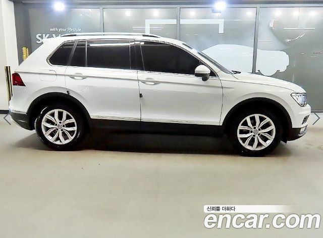 Volkswagen Tiguan 2-го поколения 2.0 TDI Premium - фото 2