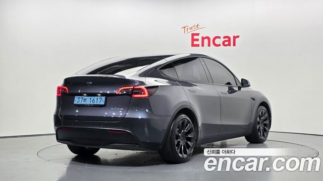 Tesla Model Y Long Range AWD - фото 1