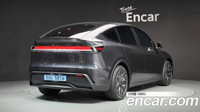 Tesla Model Y L Long Range AWD - фото 1