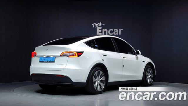 Tesla Model Y Long Range AWD - фото 1