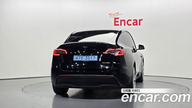Tesla Model Y Long Range AWD - фото 3