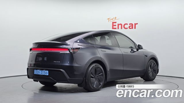 Tesla Model Y Long Range AWD - фото 1