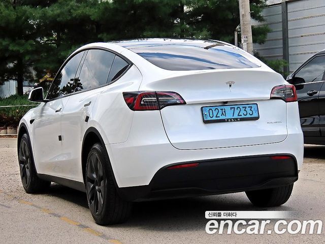Tesla Model Y Long Range AWD - фото 2