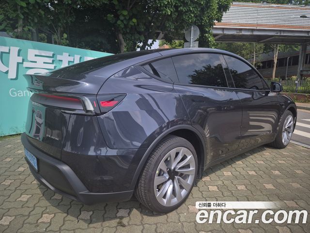 Tesla Model Y Long Range AWD - фото 4