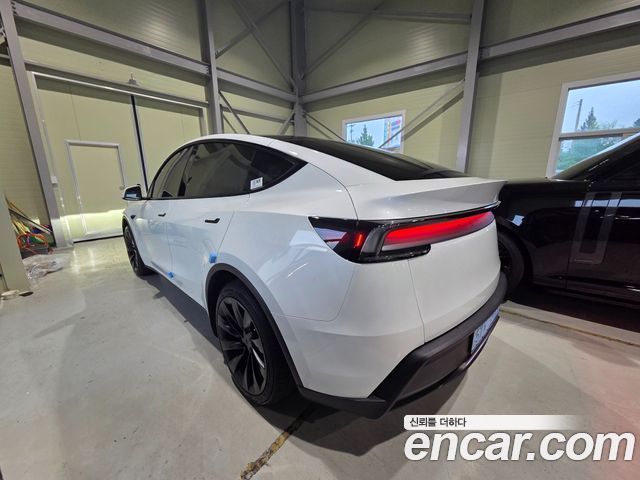 Tesla Model Y Long Range AWD - фото 1