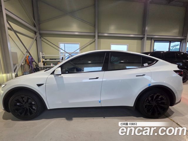 Tesla Model Y Long Range AWD - фото 4
