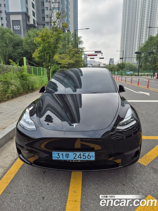 Tesla Model Y Long Range AWD - фото 2