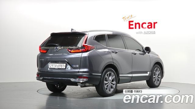 Honda CR-V 5-го поколения 2.0 Hybrid Touring 4WD - фото 0